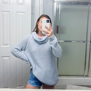 light blue turtleneck sweater